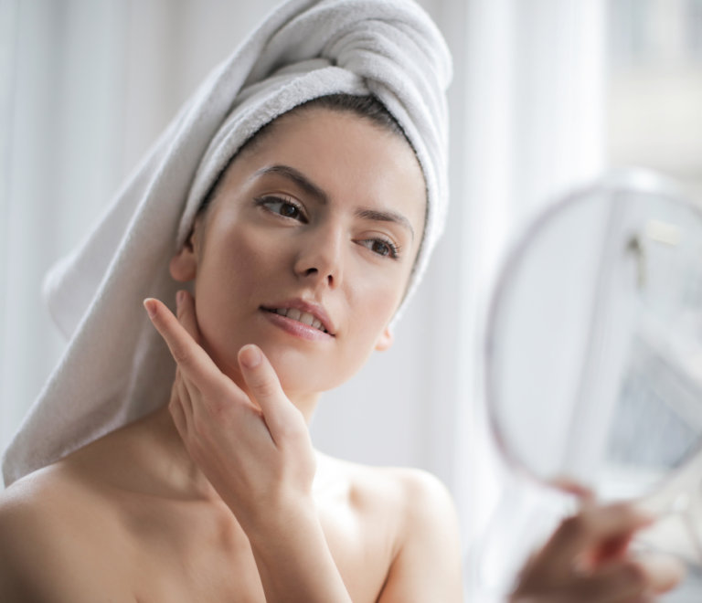 woman looking in the mirror