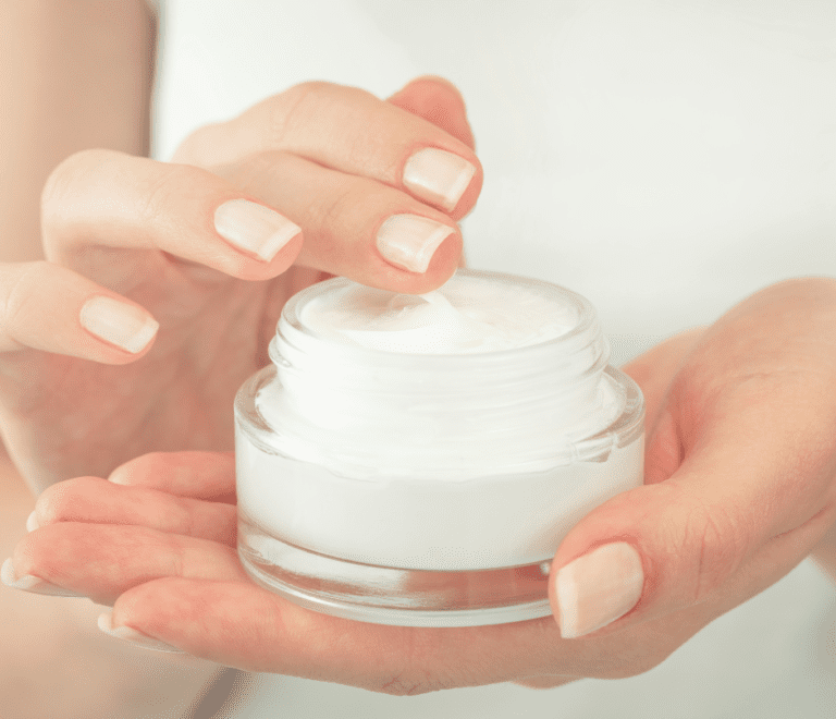 hands holding moisturizer cream