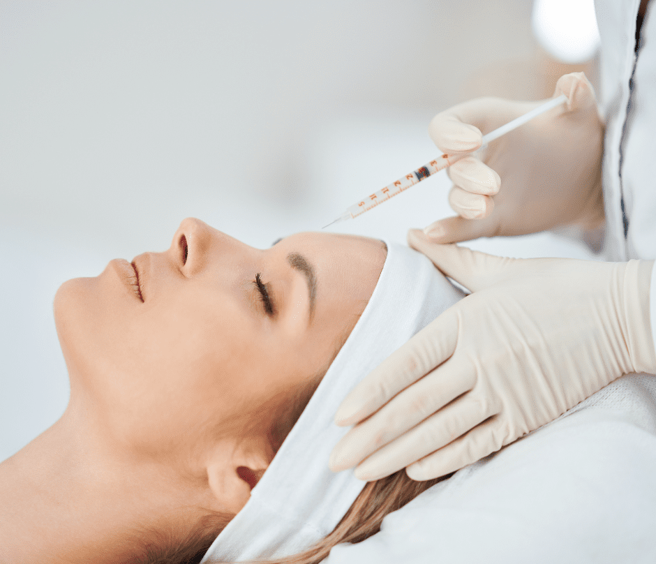 botox injection treatment is performed on a woman