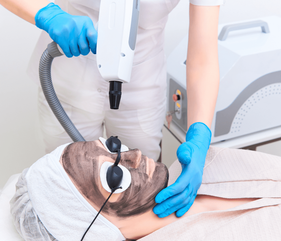 woman undergoes carbon laser facial treatment