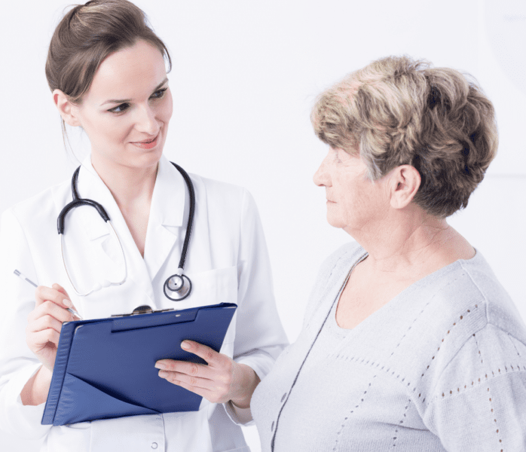 doctor talking to elder woman