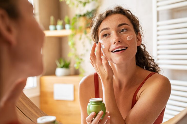 woman applying skincare