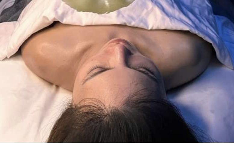 woman lying down in clinic