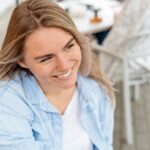 Smiling woman has smile lines