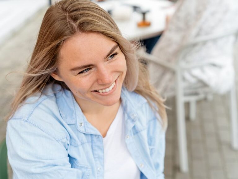 Smiling woman has smile lines