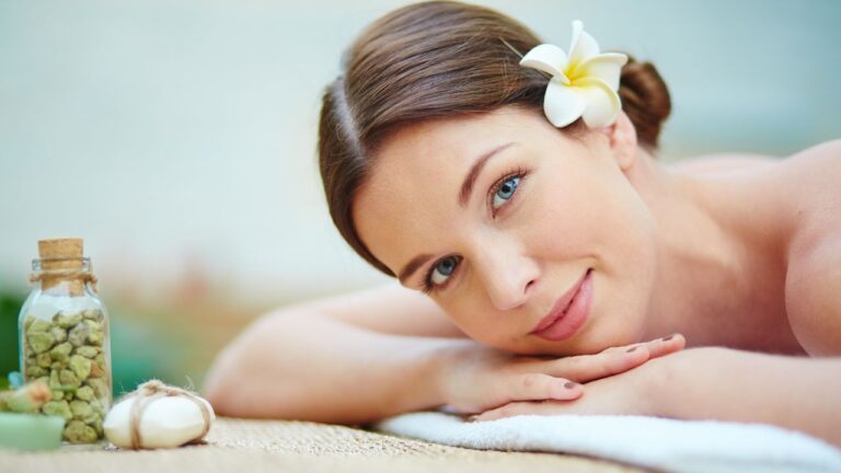 Woman lying down with smooth skin because of choosing the right skincare treatments like microneedling