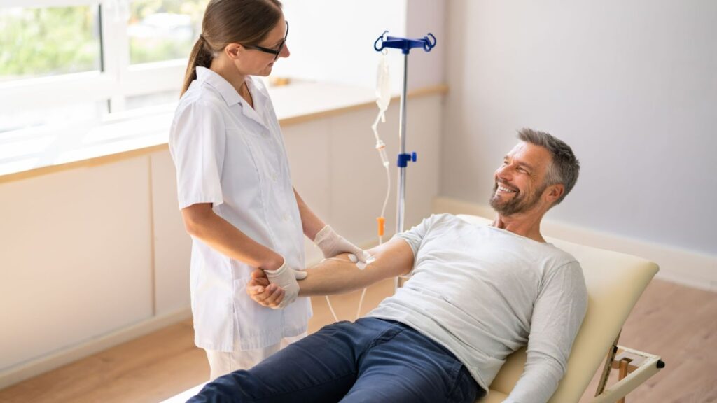 man getting IV Glutathione infusion in med spa