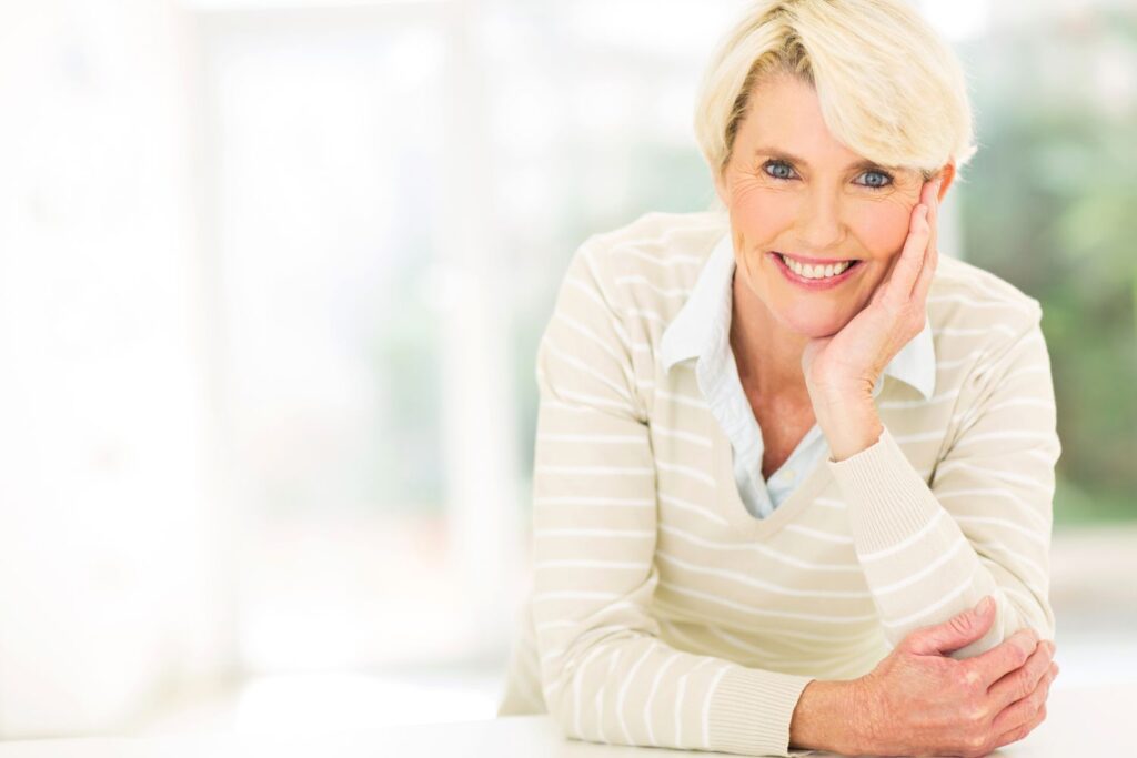 Smiling woman post-fillers at a Monrovia med spa