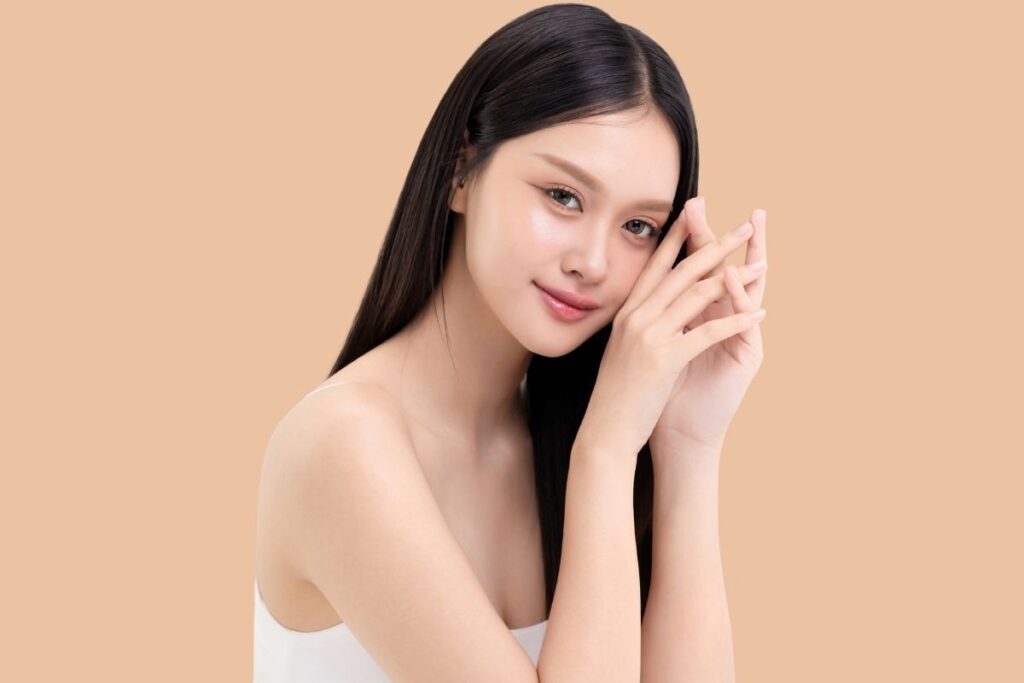 Woman with smooth, clear skin showcasing benefits of IV therapy after dermal fillers at Saint Aesthetix.