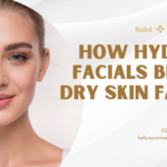 Promotional banner by Saint Aesthetix titled How Hydro Facials Beat Dry Skin Fast, featuring a woman with a glowing, highly hydrated complexion.