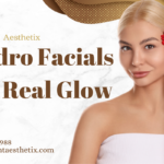 Blonde woman holding a red flower alongside text: Hydro Facials for Real Glow by Saint Aesthetix.