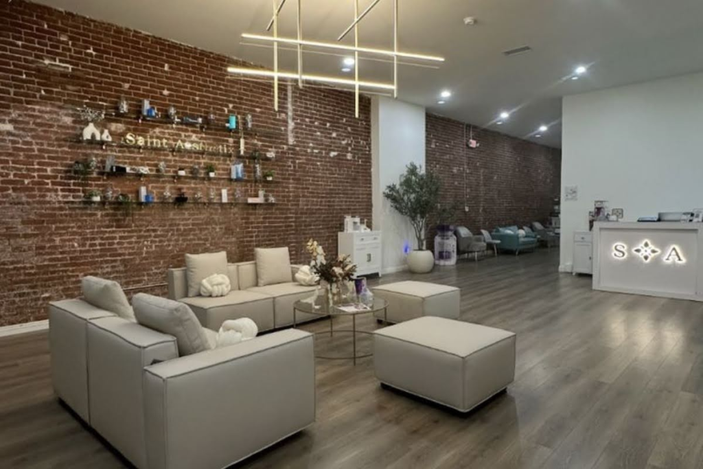 Modern waiting room and reception desk at Saint Aesthetix Med Spa