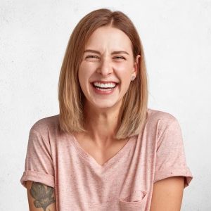 A happy woman with Dermal Fillers
