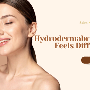 Smiling woman with smooth skin alongside a "Book Now" button and text: Why Hydrodermabrasion Feels Different by Saint Aesthetix.