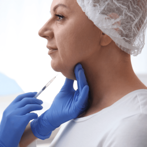 a woman facing the side while receiving an injection treatment