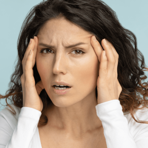 anxious woman showing her facial wrinkles
