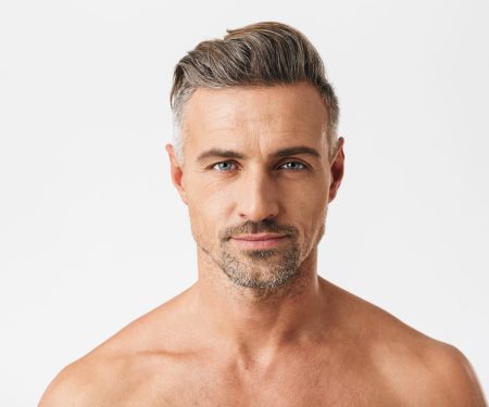 Closeup Portrait Of Smiling Half Naked Man