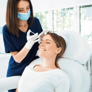 medspa therapist giving botox to woman