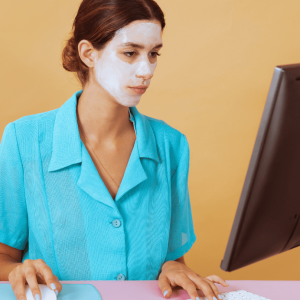 skincare while working on her desktop
