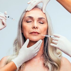 woman being injected neuromodulation therapy