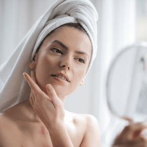 woman looking in the mirror